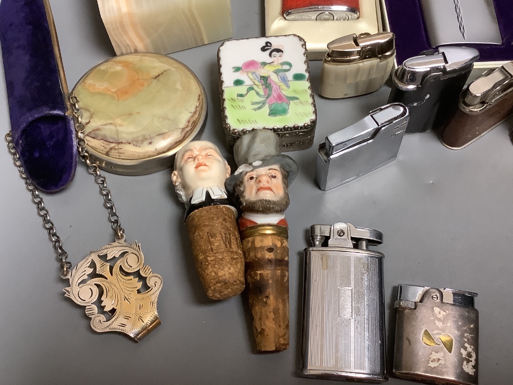 A collection of lighters and mixed collectables